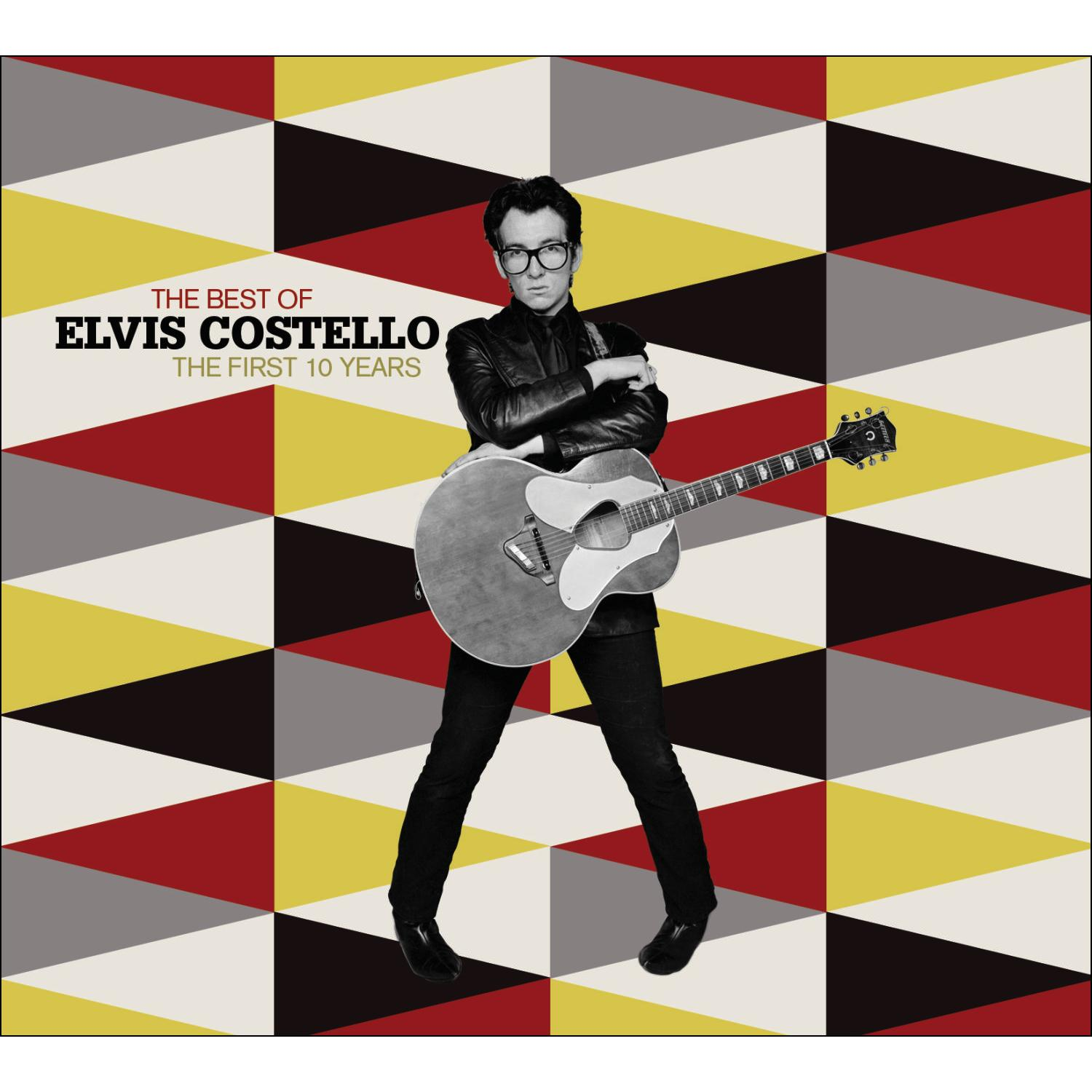 Albumcover: Elvis Costello, The Best Of. Er trägt eine Brille und hält eine Gitarre. Geometrischer Hintergrund.