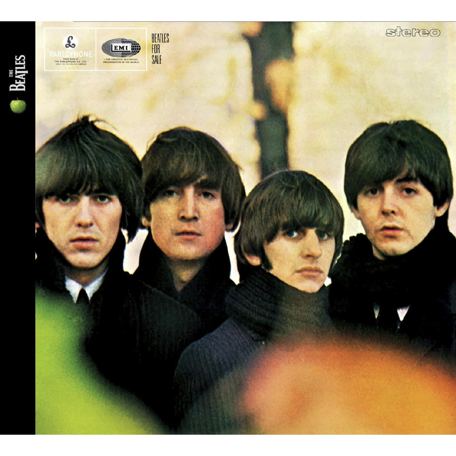 Pochette d'album : Les Beatles, quatre hommes aux coupes au bol, regardant devant eux avec des expressions sérieuses.