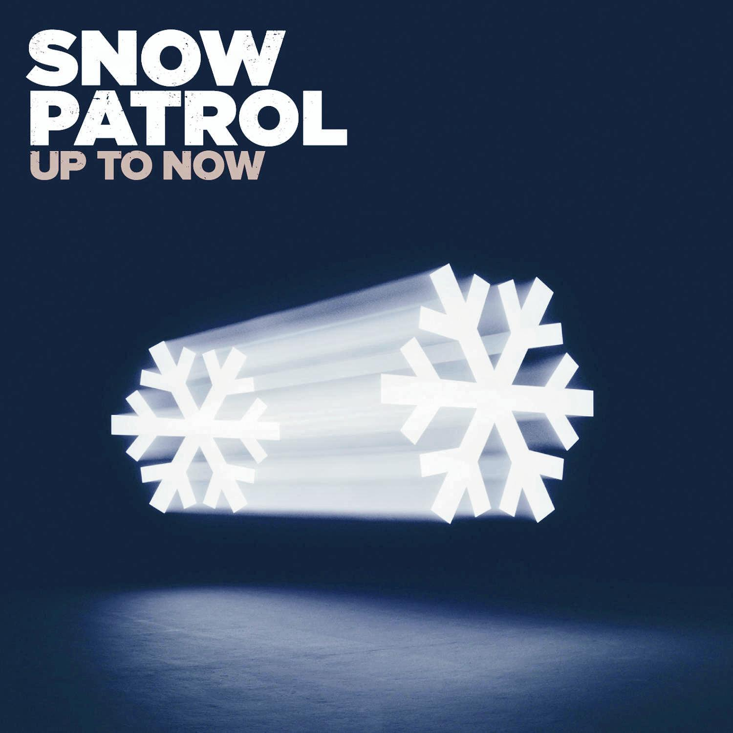 Pochette de l'album Snow Patrol. Deux flocons de neige blancs sur fond bleu foncé. Le texte dit : Up to Now.