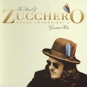 Albumcover 'Zucchero - The Best Of'. Ein Mann mit Hut, Sonnenbrille und Feder vor beigem Hintergrund.