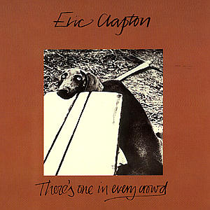 Albumcover von Eric Clapton. Ein Hund blickt über ein weißes Schild auf braunem Hintergrund.