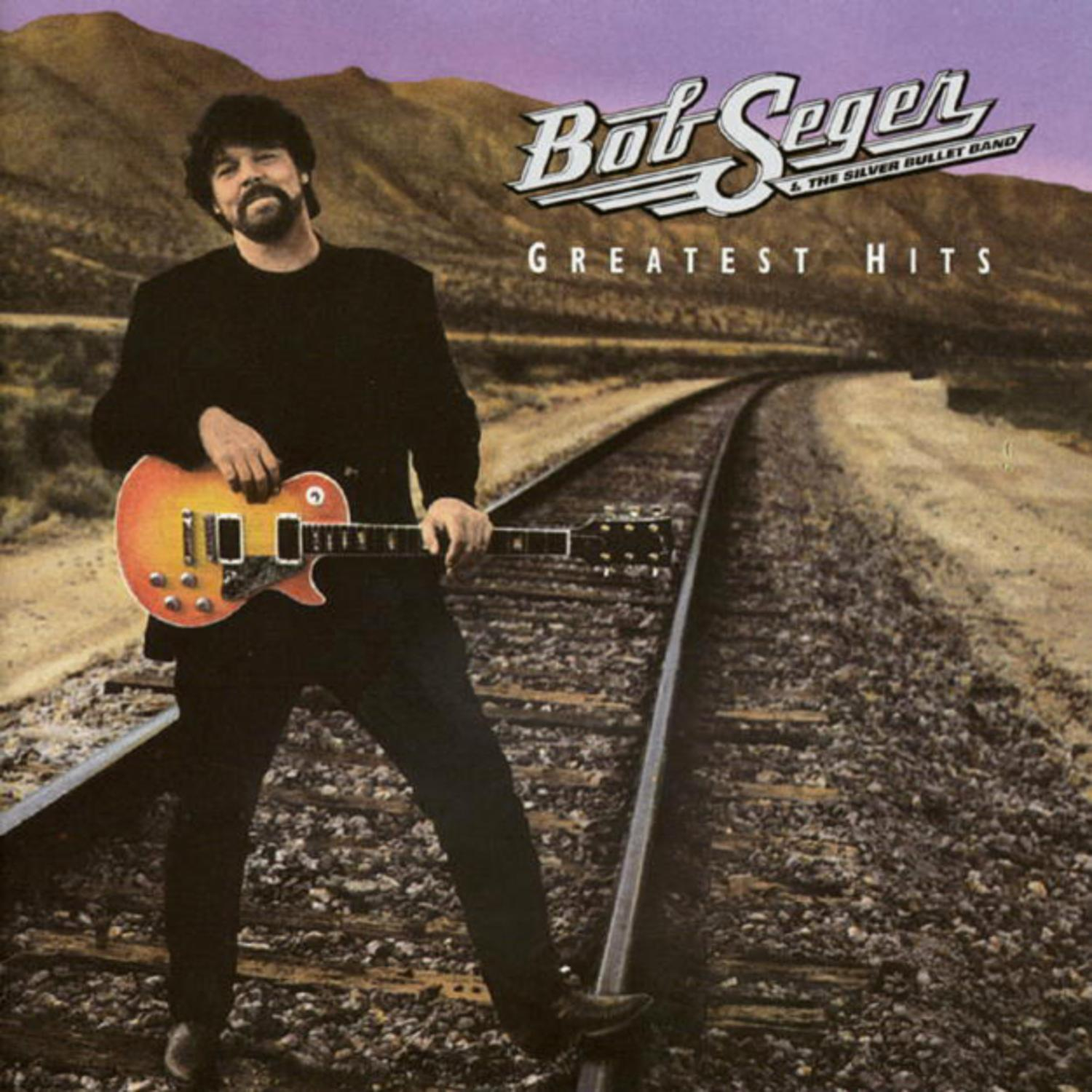 Bob Seger auf dem Albumcover, mit Gitarre auf Bahngleisen, Wüstenhintergrund.