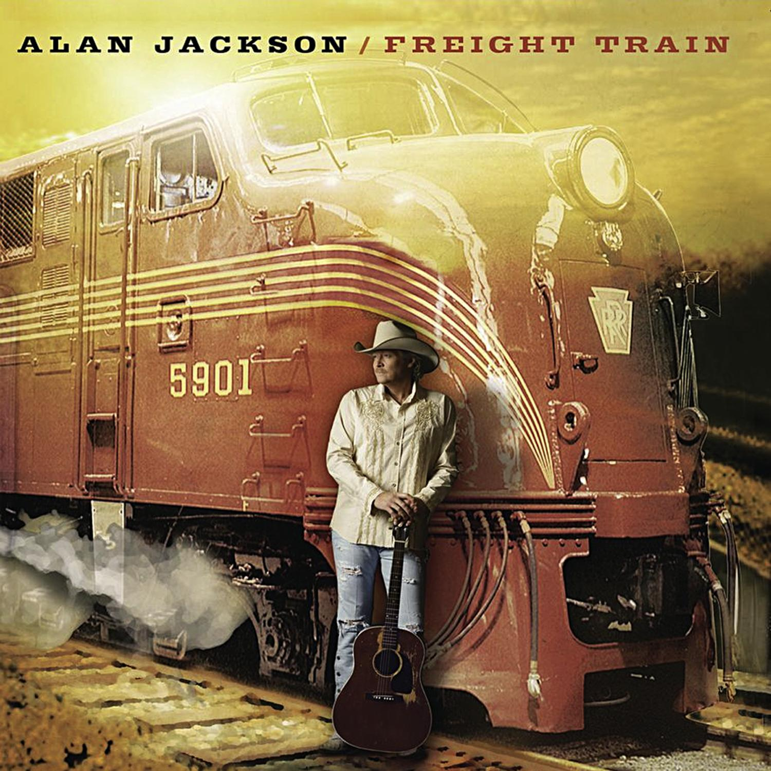 Albumcover: Mann mit Gitarre steht vor einem roten Zug. Text: Alan Jackson.