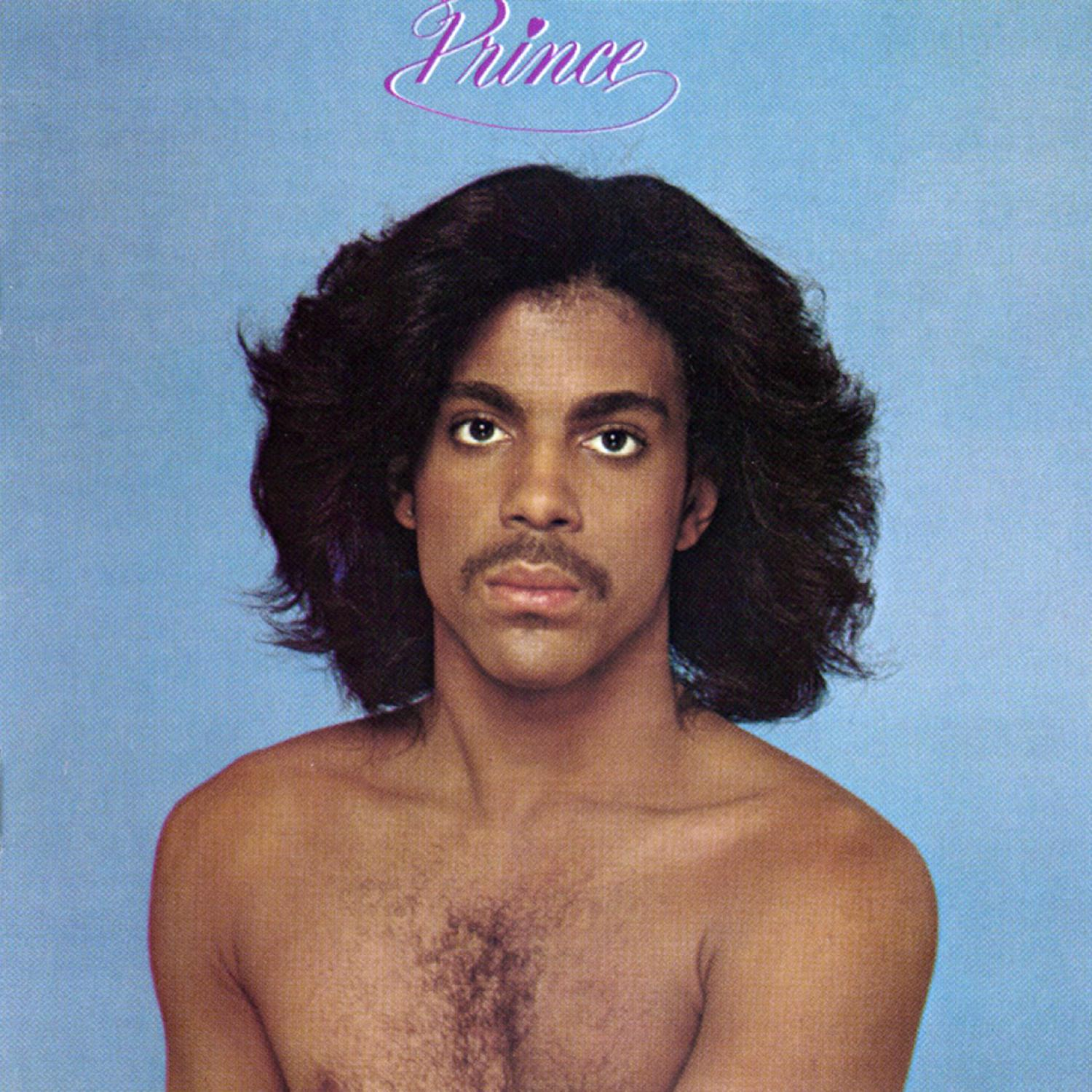 Albumcover: Ein Mann ohne Hemd mit dunklem Haar, der den Betrachter ansieht.