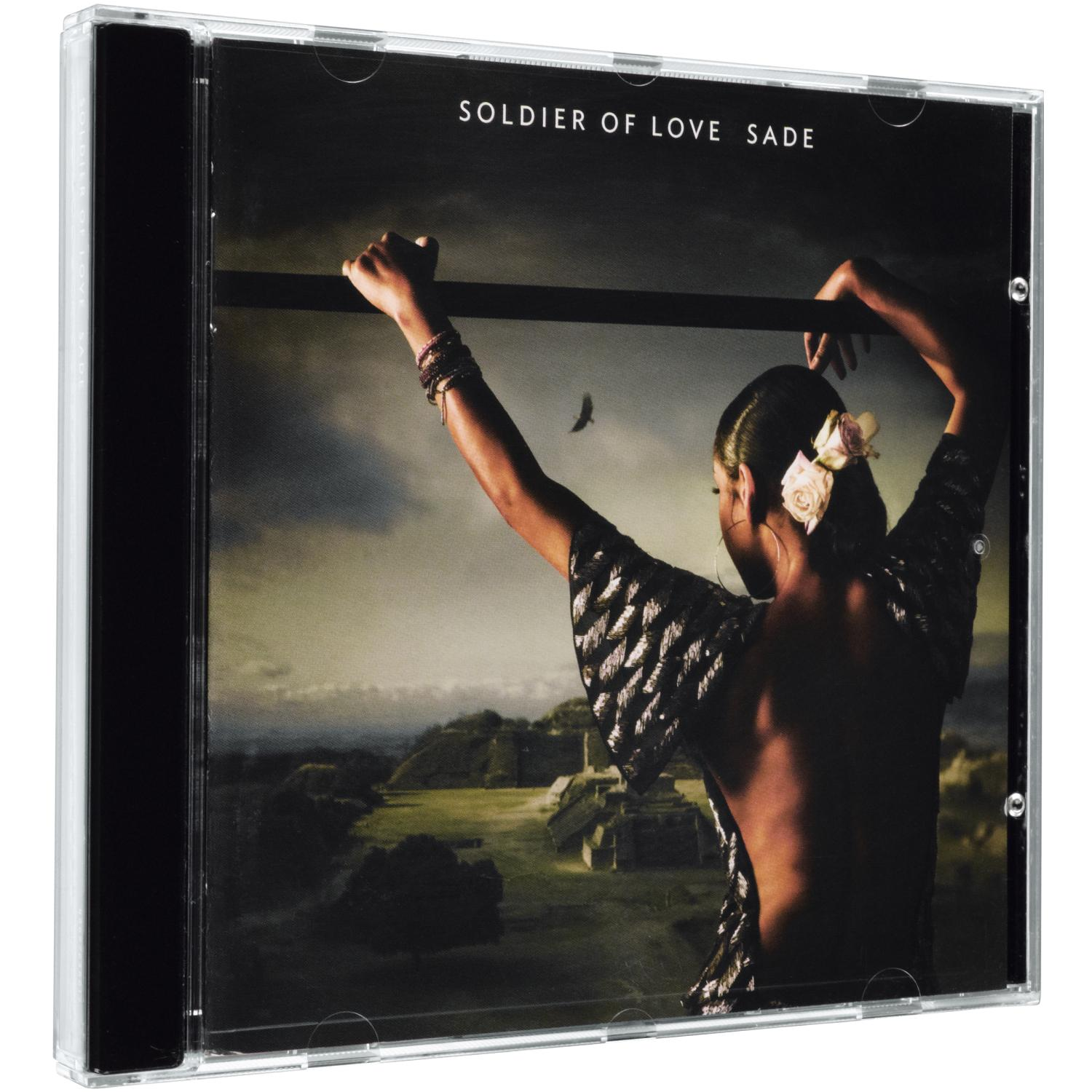 Sade Albumcover: Frau mit erhobenen Armen, die hinausblickt, mit Landschaft und Vogel.