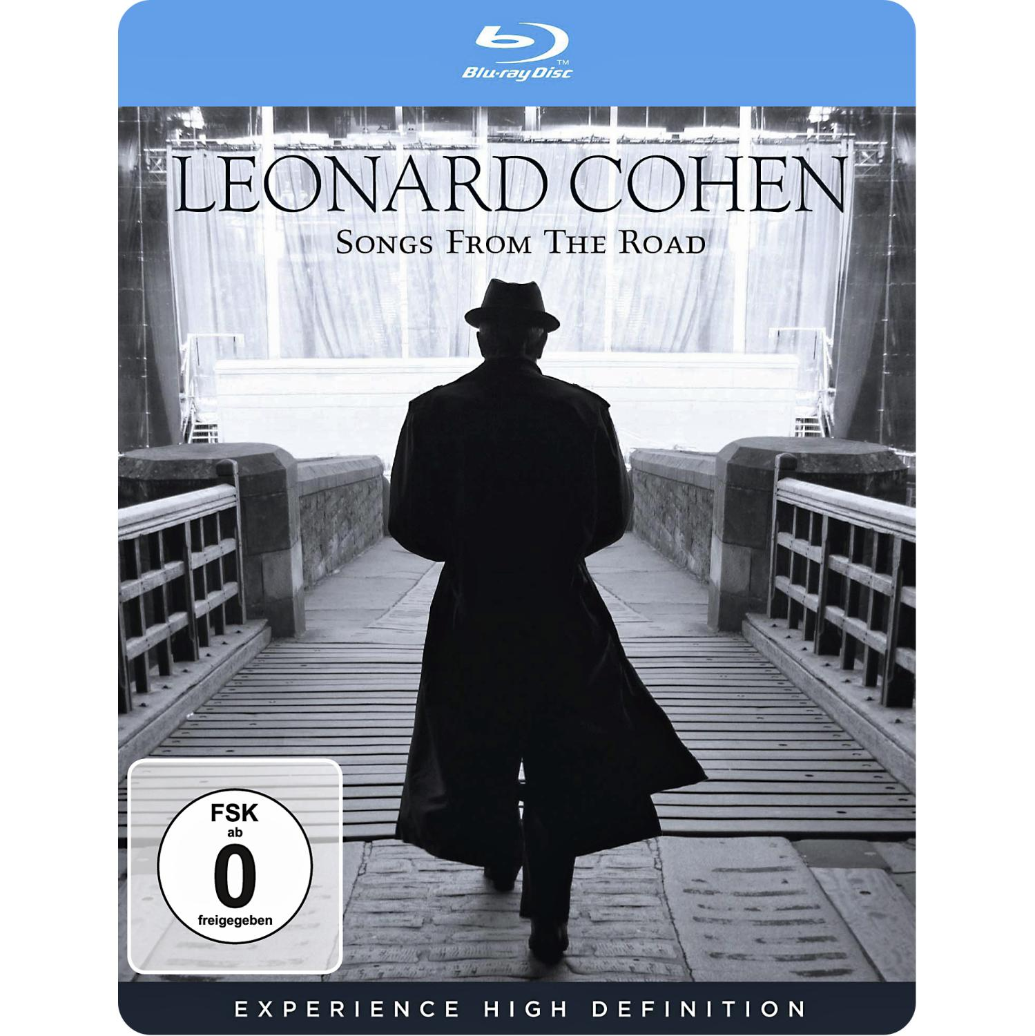 DVD-Cover, Leonard Cohen, Songs From The Road. Ein Mann im Mantel geht auf eine Brücke zu.
