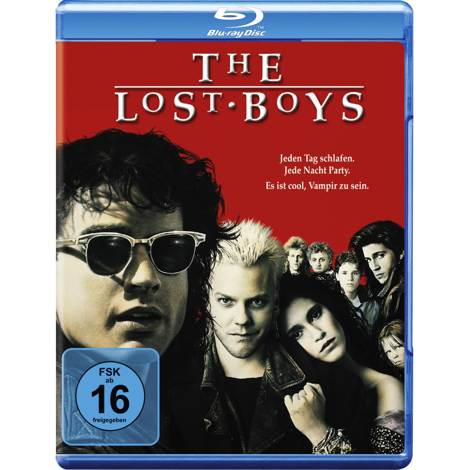 Filmcover mit mehreren Personen, darunter ein Mann mit Sonnenbrille. Roter Hintergrund, Text auf Deutsch.