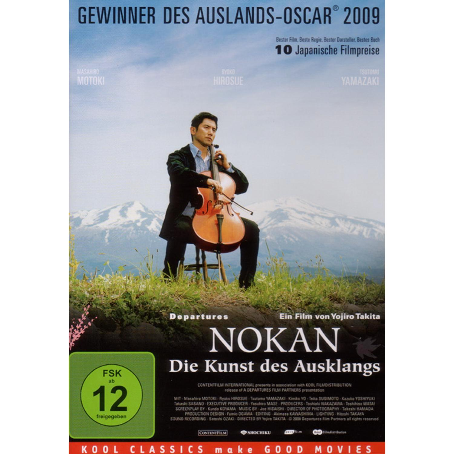 DVD-Cover für 'Departures', ein Mann spielt Cello, japanischer Text und ein Berg-Hintergrund.