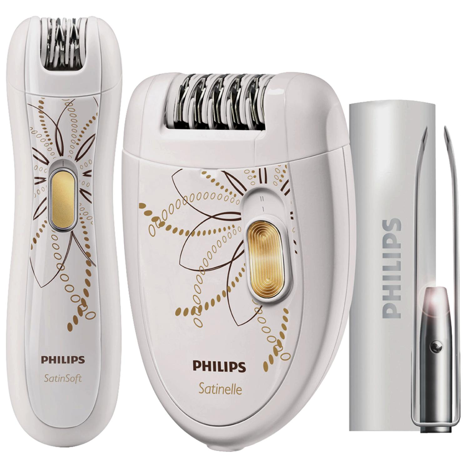 Drei weiße Philips Epilierer mit floralen Mustern und eine Pinzette.