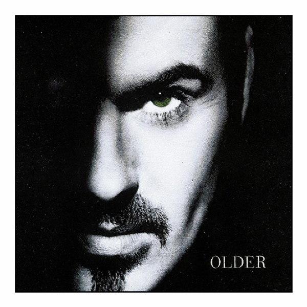 Albumhoes van George Michael. De helft van zijn gezicht, in schaduw, met één groen oog zichtbaar.