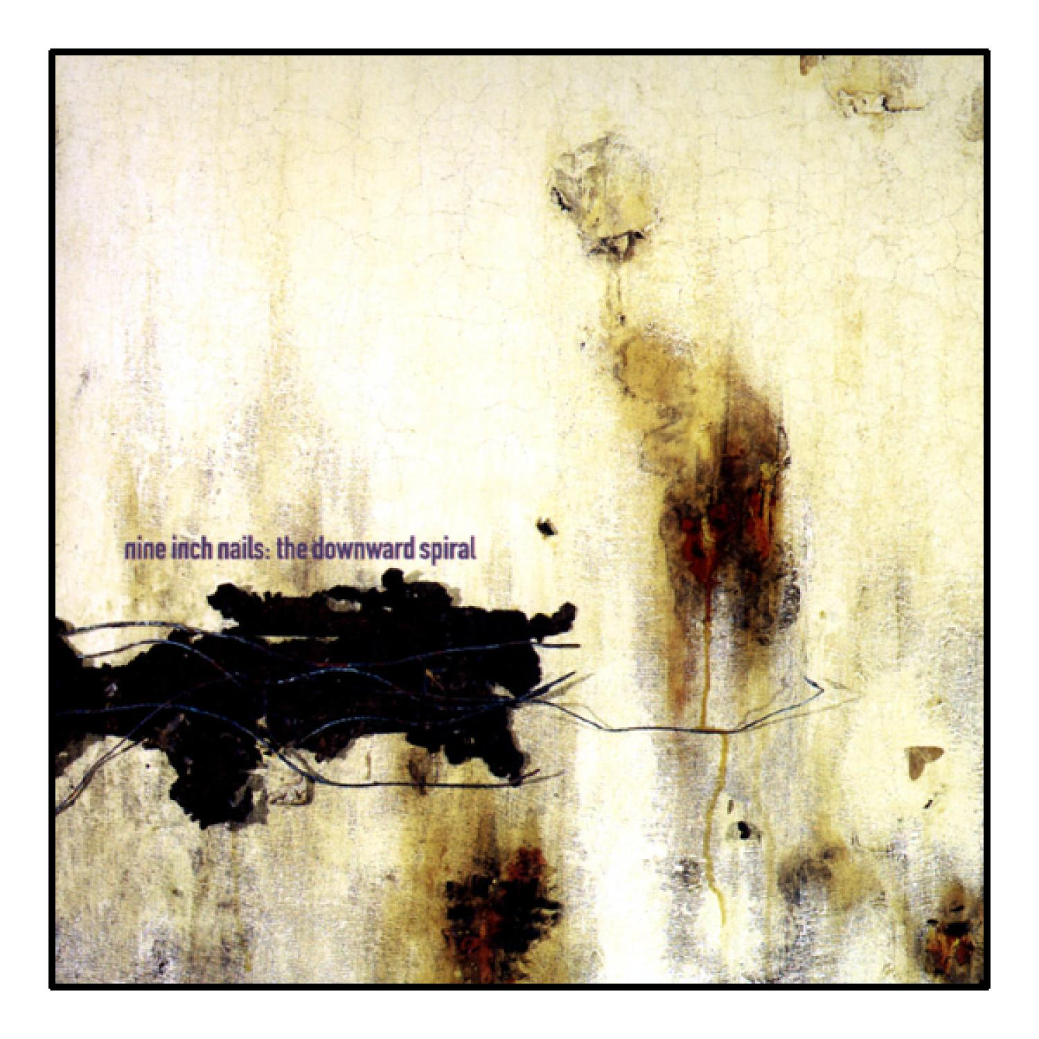 Albumcover für Nine Inch Nails, the downward spiral. Eine beschädigte Wand mit Farbe.