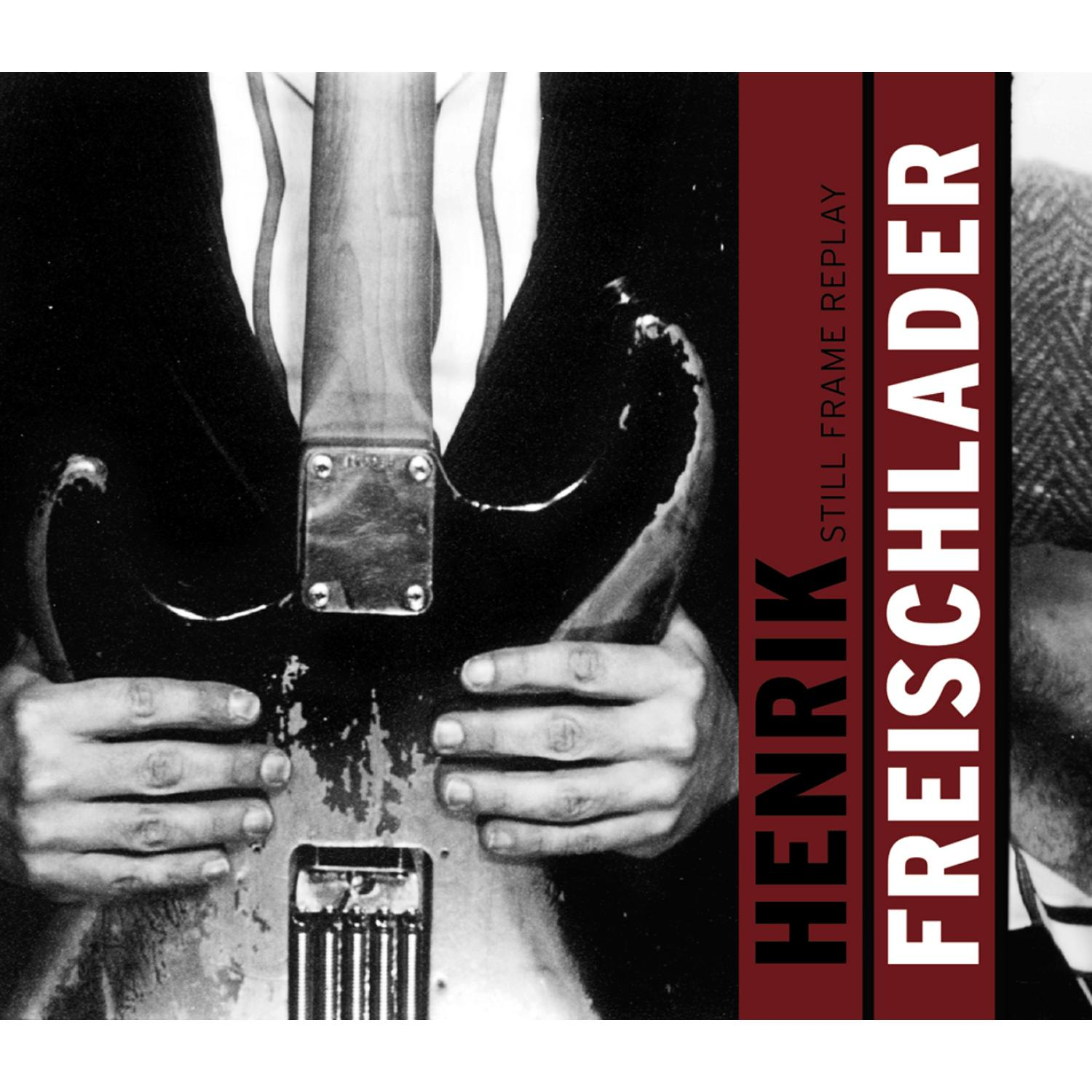 Henrik Freischlader Albumcover. Hände halten eine schwarze Gitarre mit Text rechts.