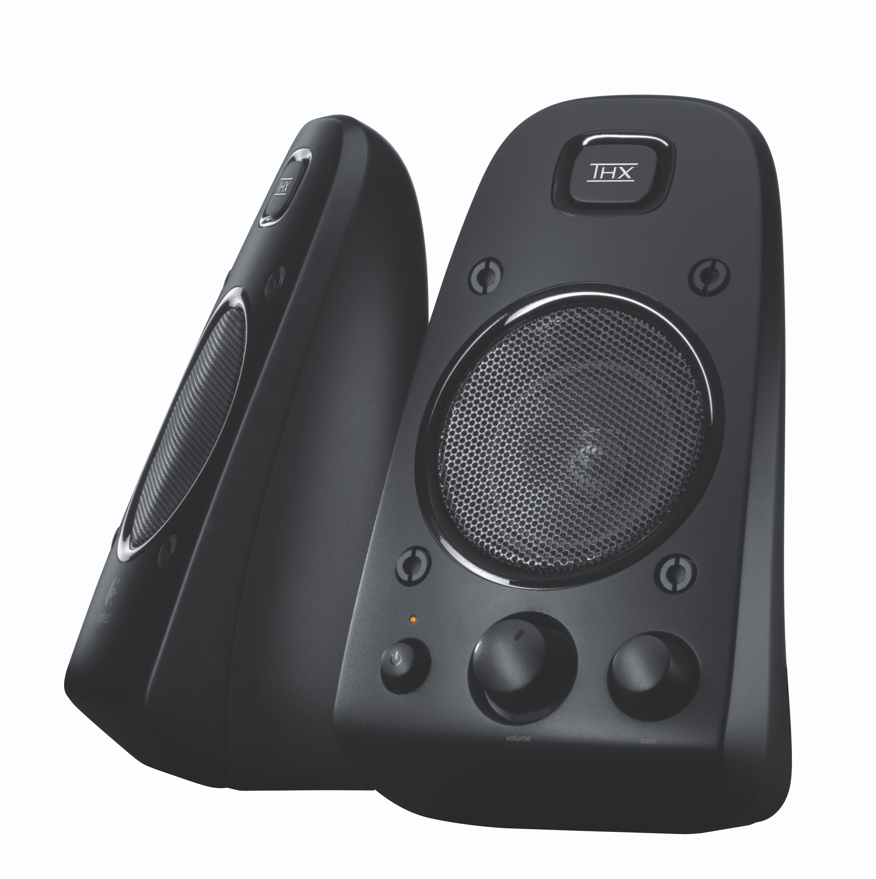 Two black Logitech speakers with mesh grills, volume control.