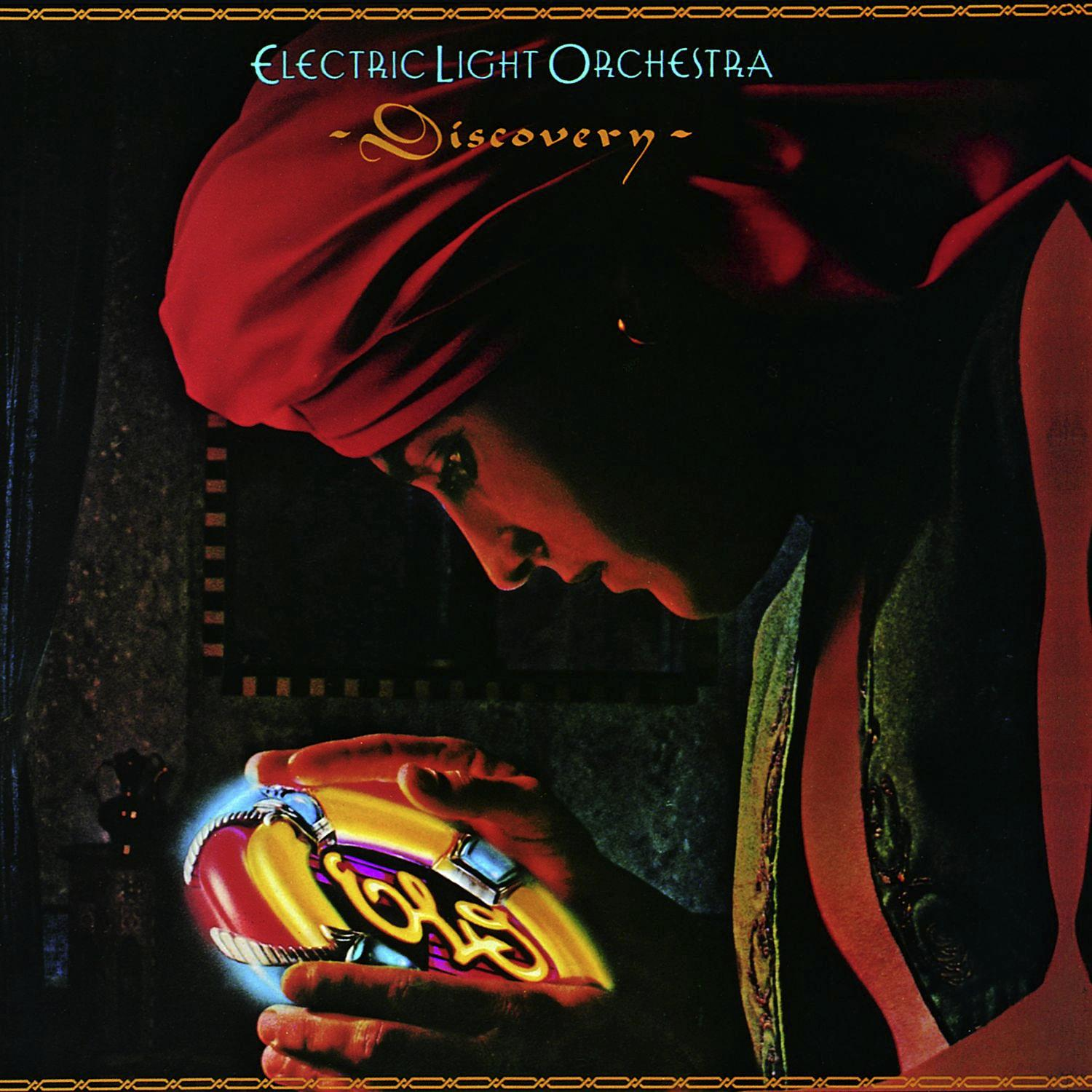 Albumcover: Mann mit Turban hält leuchtendes Objekt. Titel: Electric Light Orchestra - Discovery.