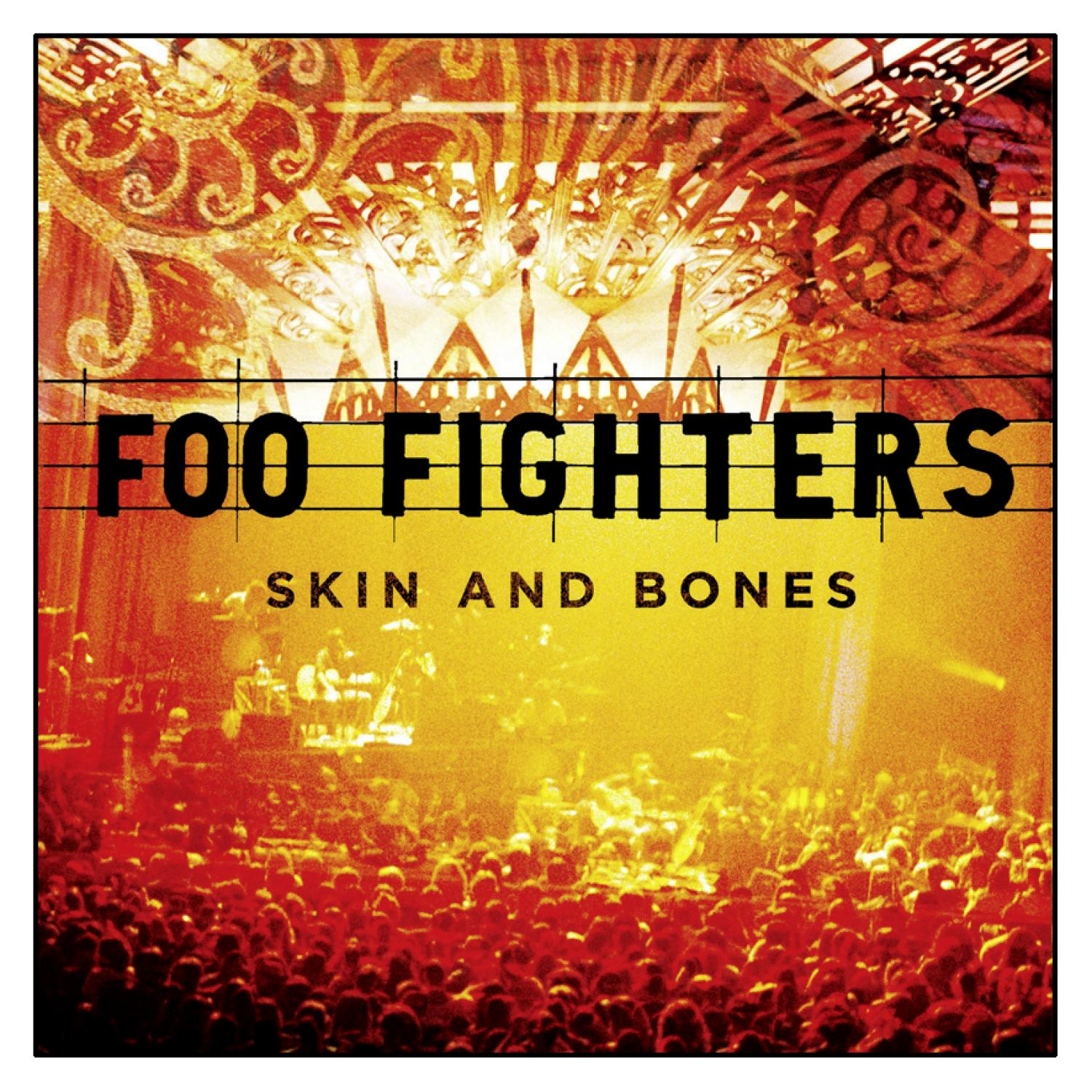 Albumcover der Foo Fighters mit einer Bühnenaufführung. Gelb-rotes Farbschema. Text: Skin and Bones.