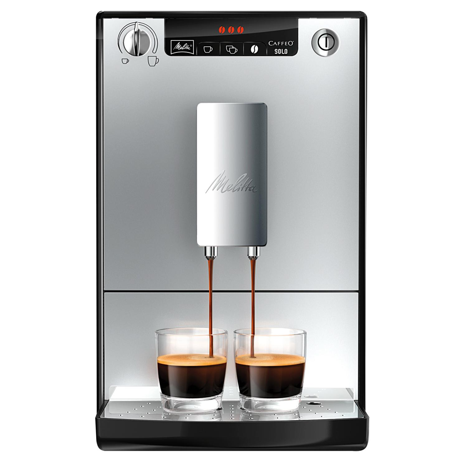 Une machine à café Melitta argentée et noire qui prépare du café dans deux verres transparents. La machine a des boutons.