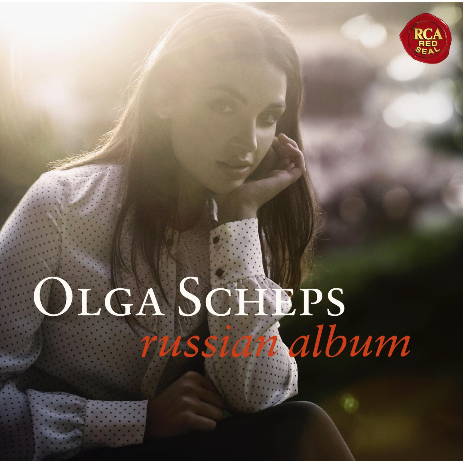 Albumcover mit einer Frau, die in die Kamera schaut.