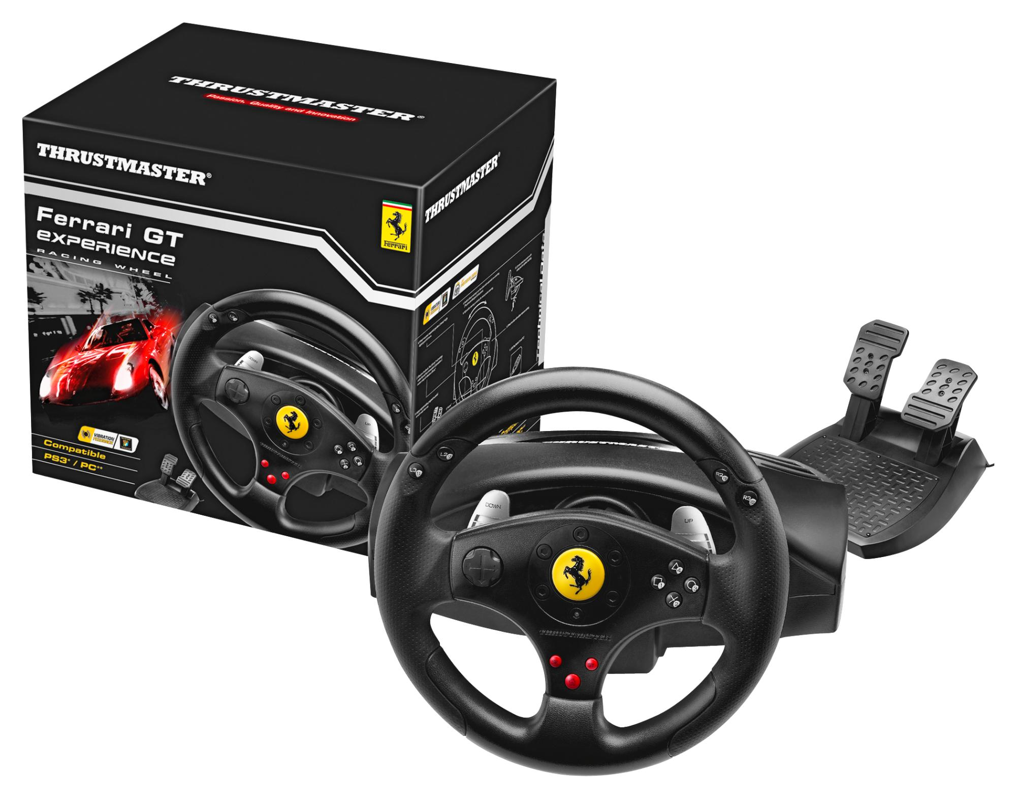 Volante y pedales de carreras en caja. Volante negro con logo Ferrari. Incluye pedales.