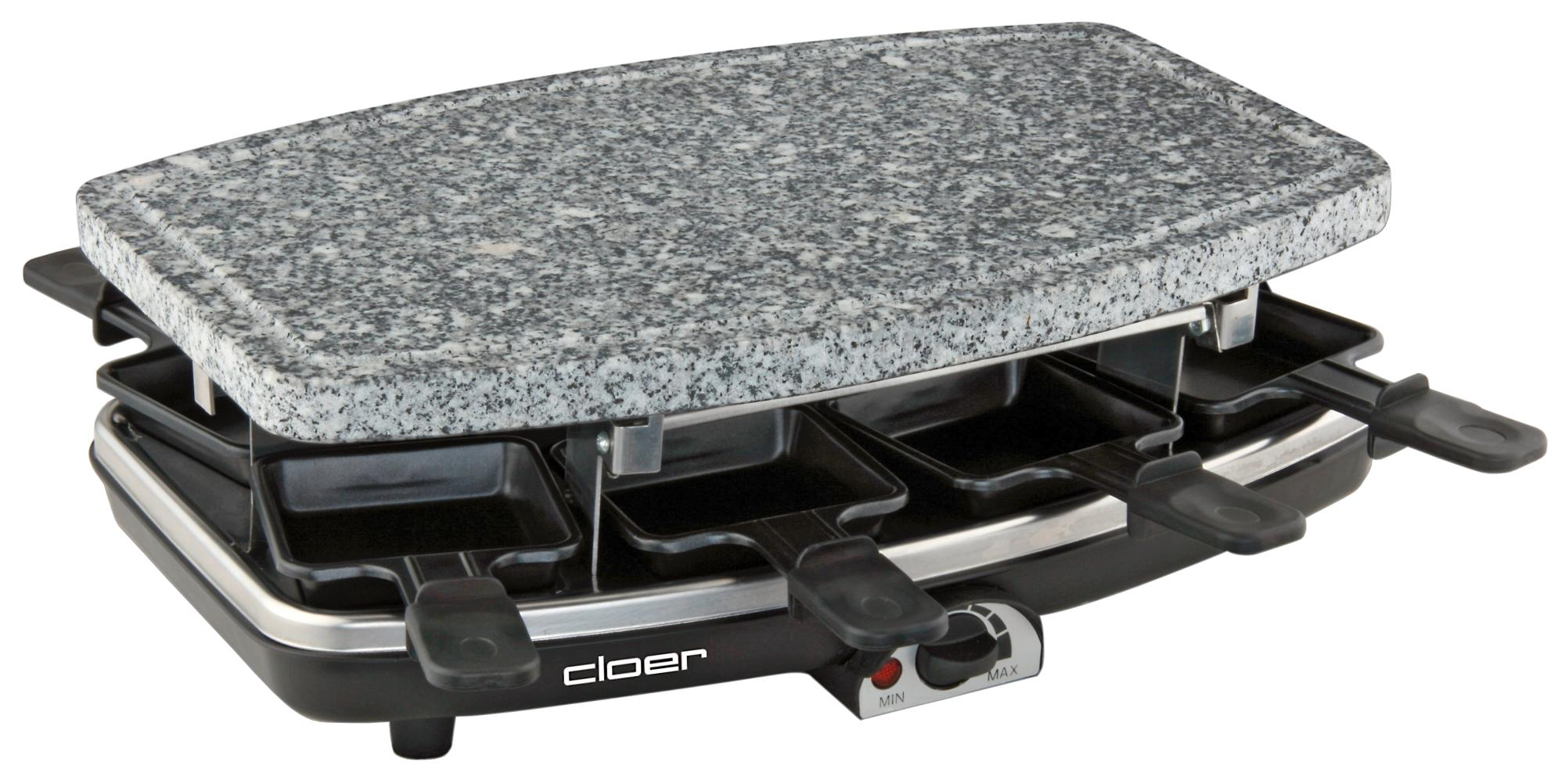 Raclette-Grill mit Granitsteinplatte und kleinen Käsepfannen darunter.