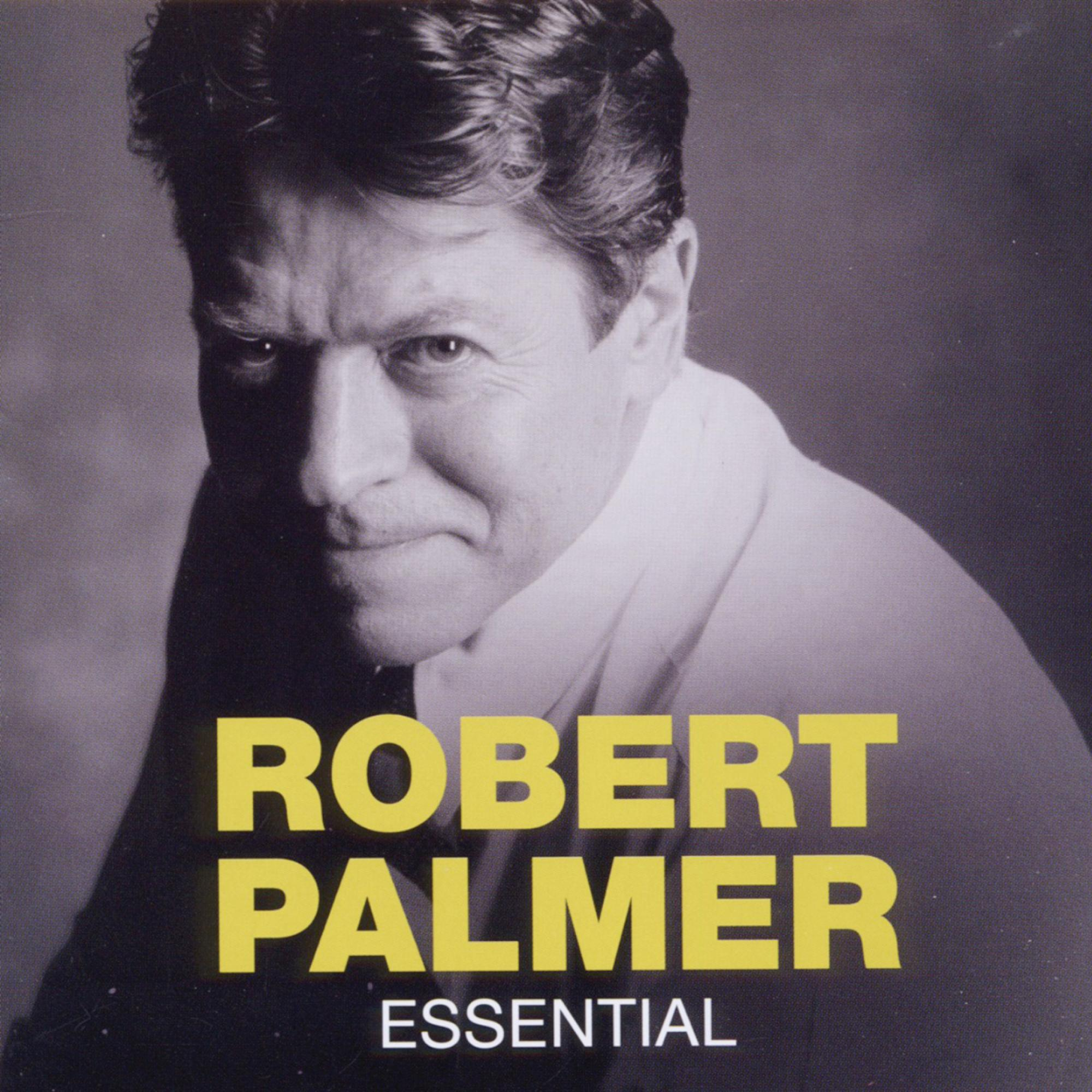 Robert Palmer, ein Mann in einem weißen Hemd, mit dem Wort "ESSENTIAL" darunter und seinem Namen in Gelb.