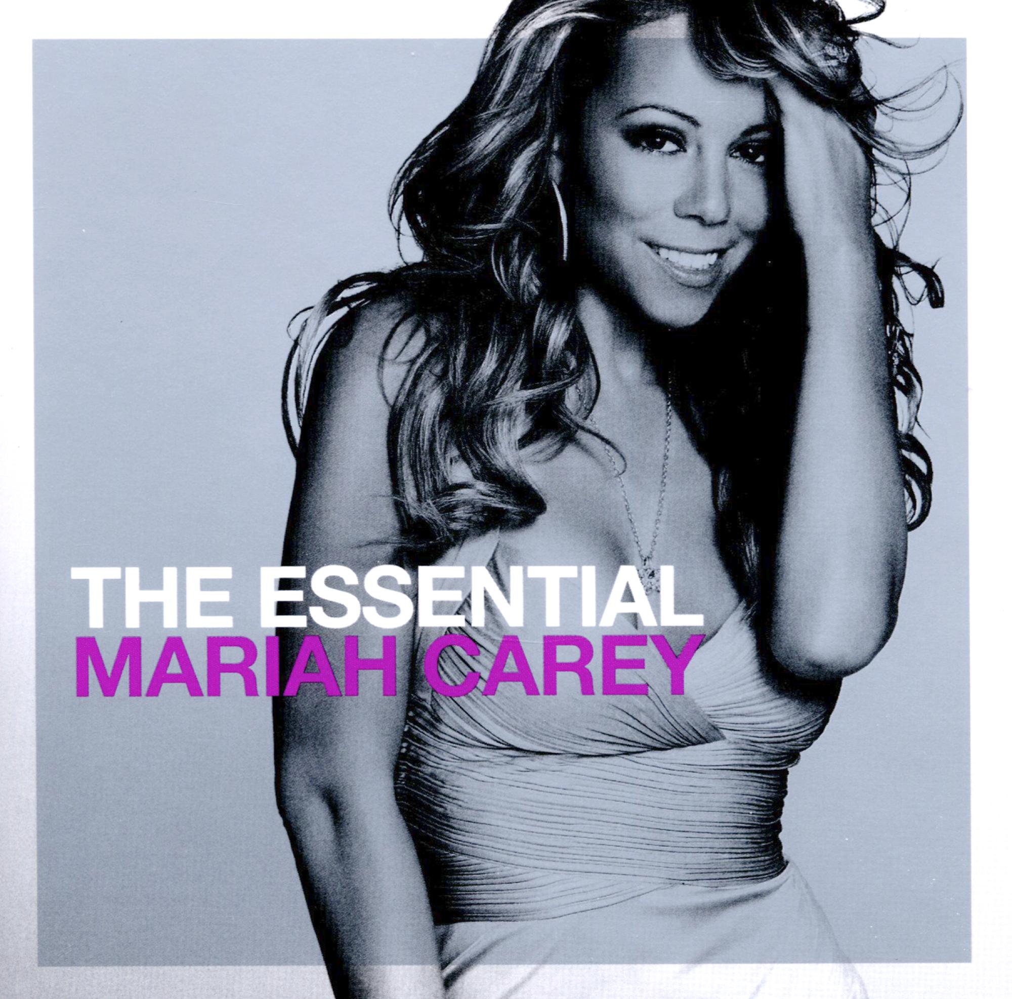 Albumcover von 'The Essential Mariah Carey'. Mariah Carey lächelt und berührt ihr Haar.