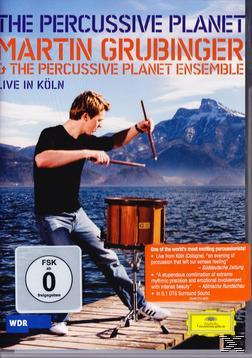DVD-Cover für 'The Percussive Planet', mit einem Schlagzeuger vor Bergkulisse.