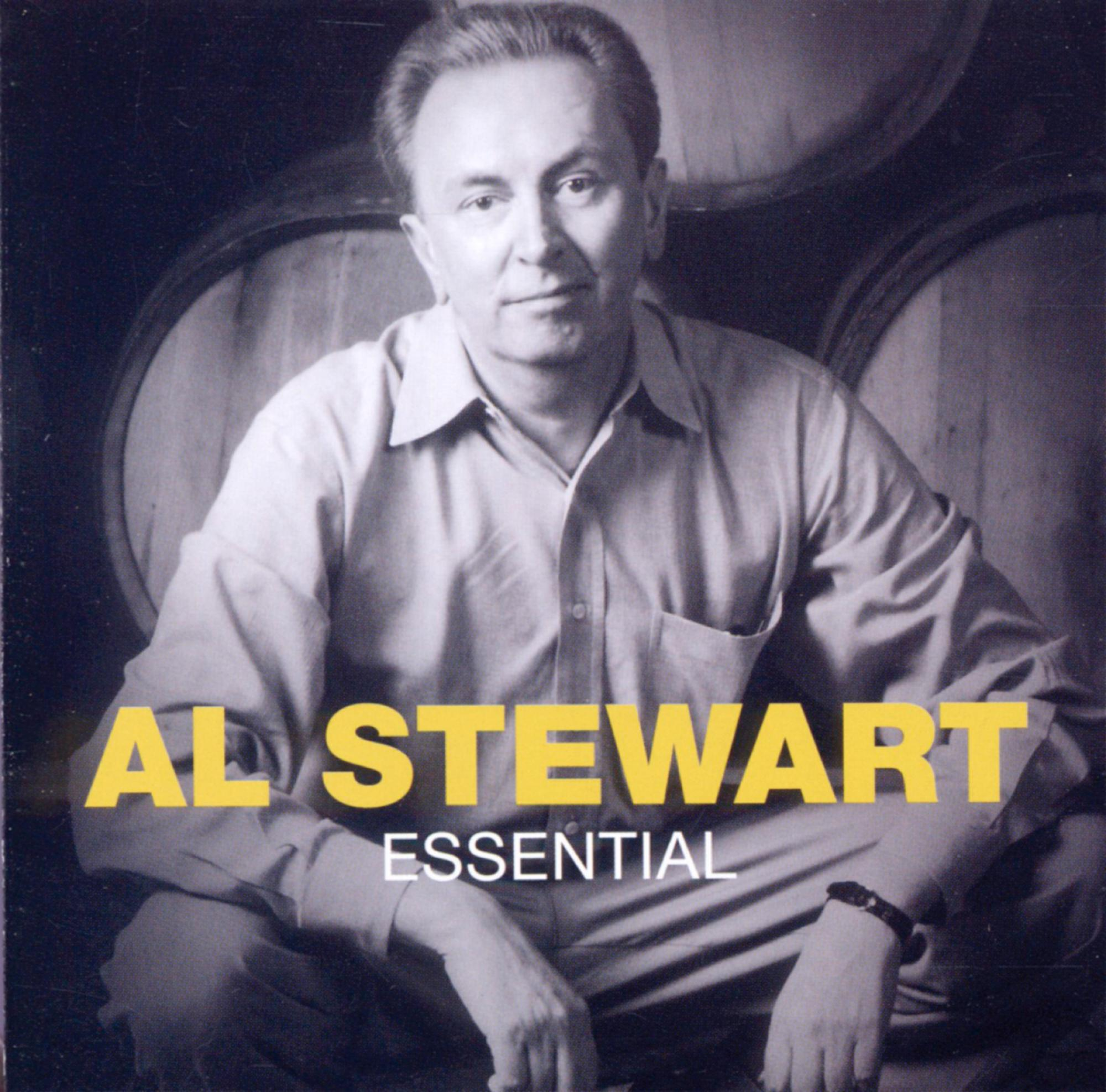 Albumcover mit Al Stewart, der ein Hemd trägt, mit Fässern im Hintergrund und den Worten 'AL STEWART ESSENTIAL'.