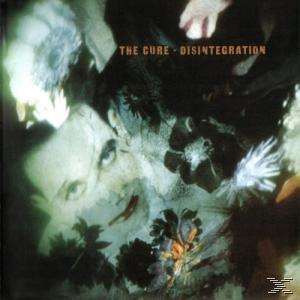 Albumcover für 'Disintegration' von The Cure, mit einem Gesicht inmitten von Blumen.