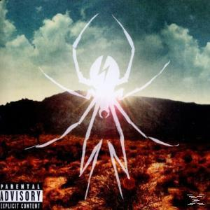 Albumcover: Spinne mit Blitz. Dunkler Hintergrund mit Bergen. Parental Advisory.