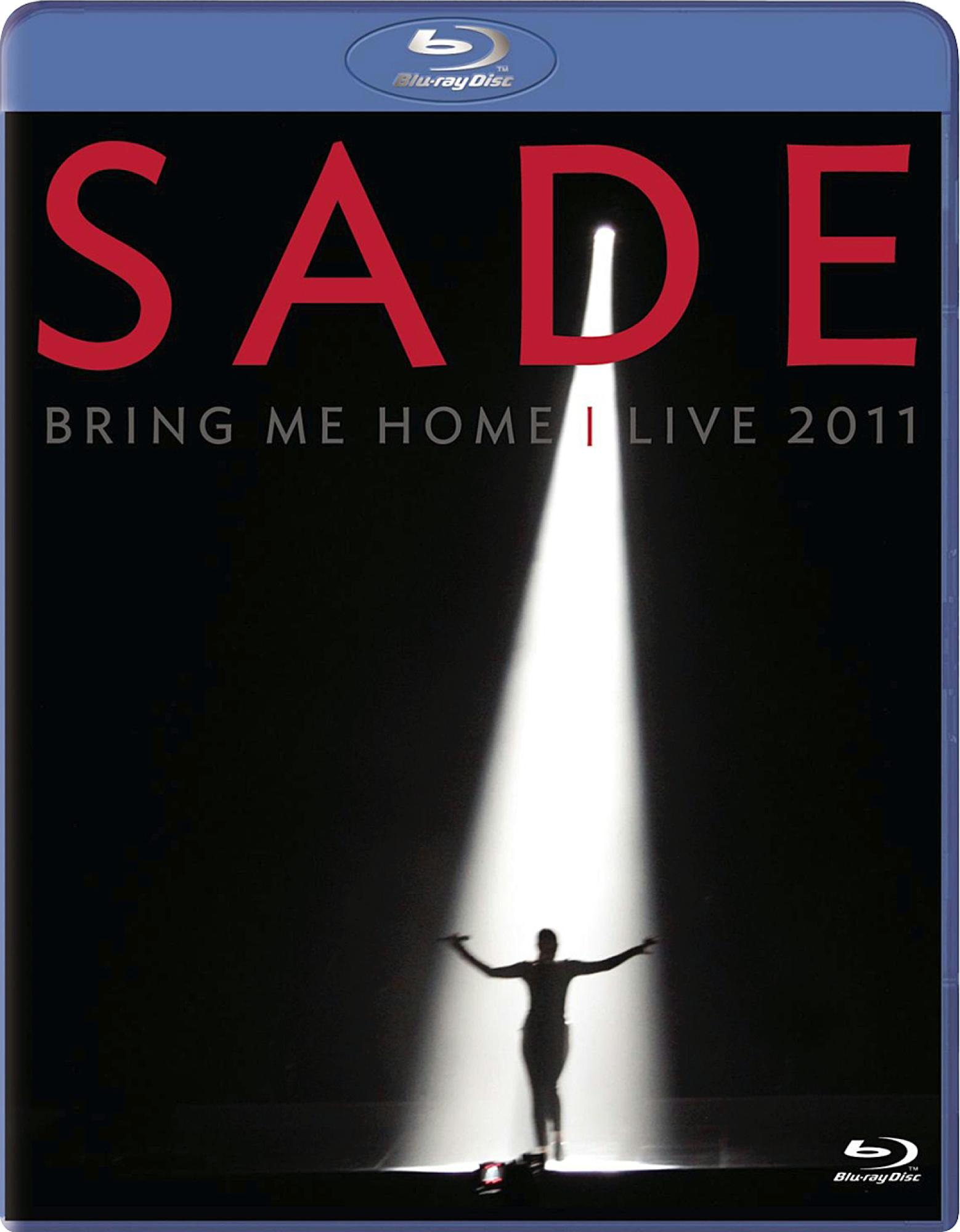 Sade DVD-Cover. Silhouette der Sängerin im Rampenlicht. Blaues Gehäuse.