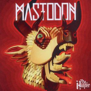 CD-Cover mit einem Monsterkopf mit Hörnern und Zähnen auf rotem Hintergrund. The Hunter steht unten.