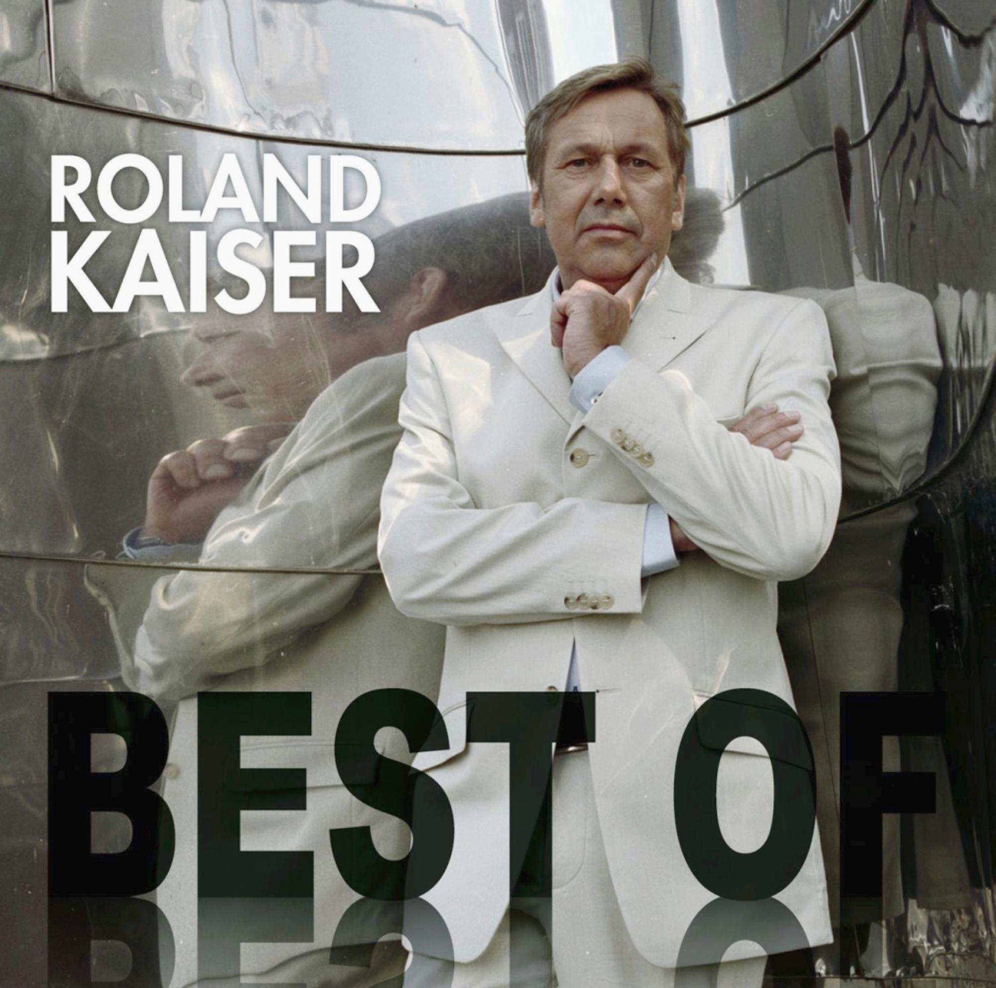 Roland Kaiser Albumcover. Ein Mann im weißen Anzug mit gespiegeltem Hintergrund. Die Worte 'BEST OF'.