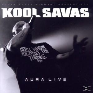 Kool Savas Albumcover. Rapper mit Mikrofon, gestikulierend, Schwarz-Weiß-Foto.
