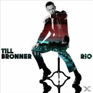 Albumcover von Till Brönner, im Anzug, auf einem Hocker sitzend. Der Hintergrund zeigt eine Stadtlandschaft.