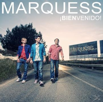 Marquess Albumcover. Drei Männer gehen auf einer Straße. ¡Bienvenido! steht oben.