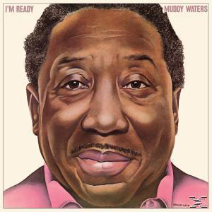 Album borító. Muddy Waters arcának közelképe rózsaszín ingben.
