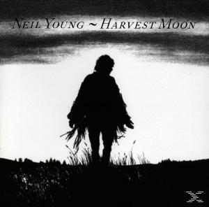 Neil Young Albumcover: Silhouette einer Person auf einem Feld bei Sonnenuntergang, mit Text.