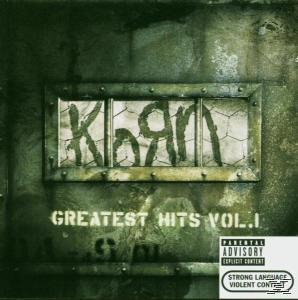 Korn-Albumcover mit grünem Hintergrund und metallischem Rahmen. Der Name der Band und Albumtitel sind sichtbar.