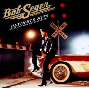 Bob Seger Albumcover, Mann sitzt auf einem roten Auto in der Nähe eines Bahnübergangs.