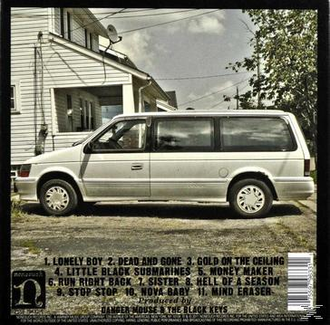 The Black Keys Albumcover. Weißer Van geparkt, Text unten.