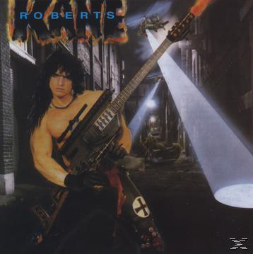 Albumcover mit einem oberkörperfreien Mann, der Gitarre auf einer dunklen Straße spielt.
