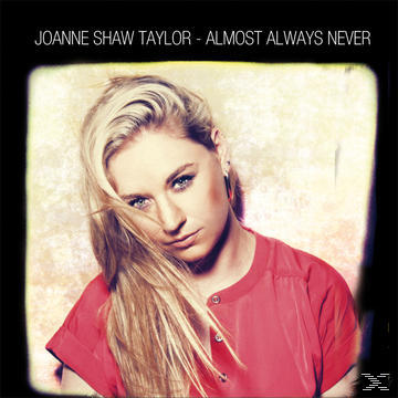 Albumcover: Blonde Frau im rosa Hemd, blickt nach unten. Text: 'Joanne Shaw Taylor'.