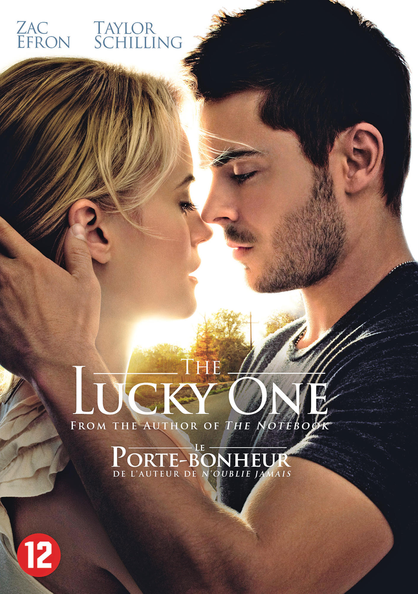 Affiche de film. Un couple se touche le visage. Titre : The Lucky One. Acteurs : Zac Efron, Taylor Schilling. Titre français : Le Porte-Bonheur.