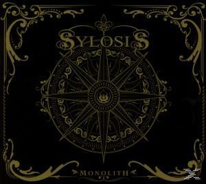 Albumcover für 'Sylosis - Monolith', ein Kompassdesign in Gold auf schwarzem Hintergrund.