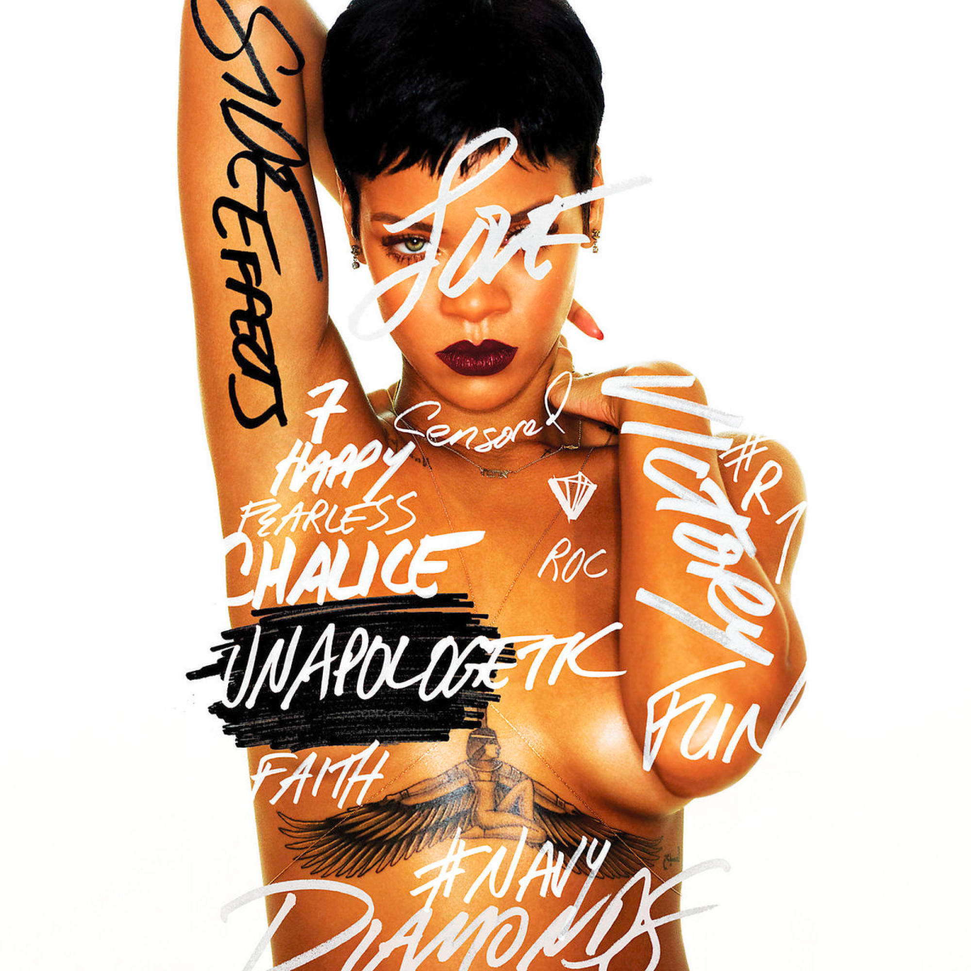 Albumcover mit Rihanna, bedeckt mit Wörtern, mit teilweise entblößtem Körper und Tattoos.