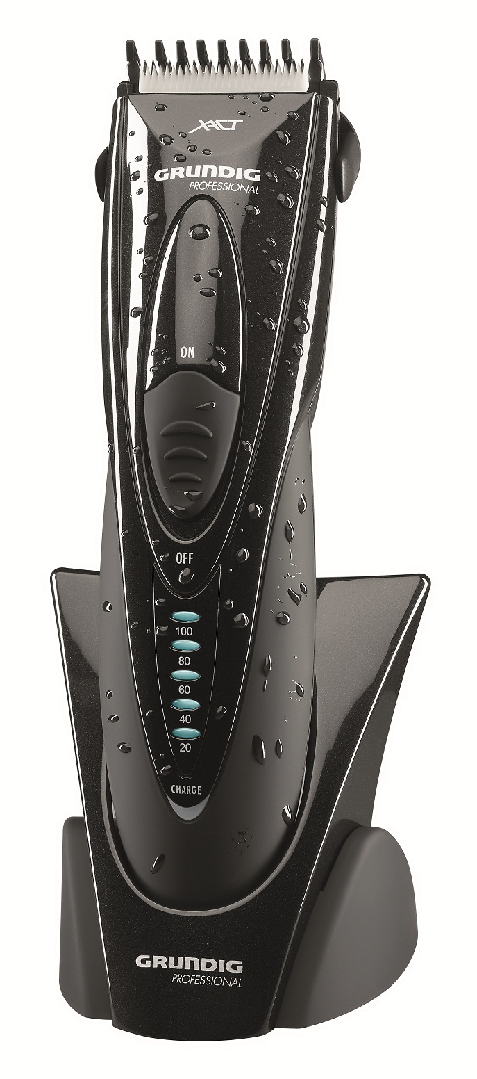 Schwarzer Grundig Professional Haarschneider auf seinem Ständer. Es hat ein digitales Display und eine Ladestation.