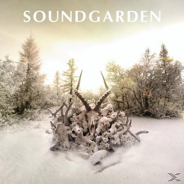 Albumcover, Geweih und Schädel im Schnee. Waldhintergrund. Bandname oben, Logo unten.