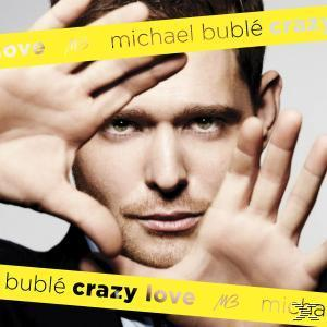 Albumcover. Michael Bublé mit Händen, die sein Gesicht umrahmen. Gelber Text: crazy love.