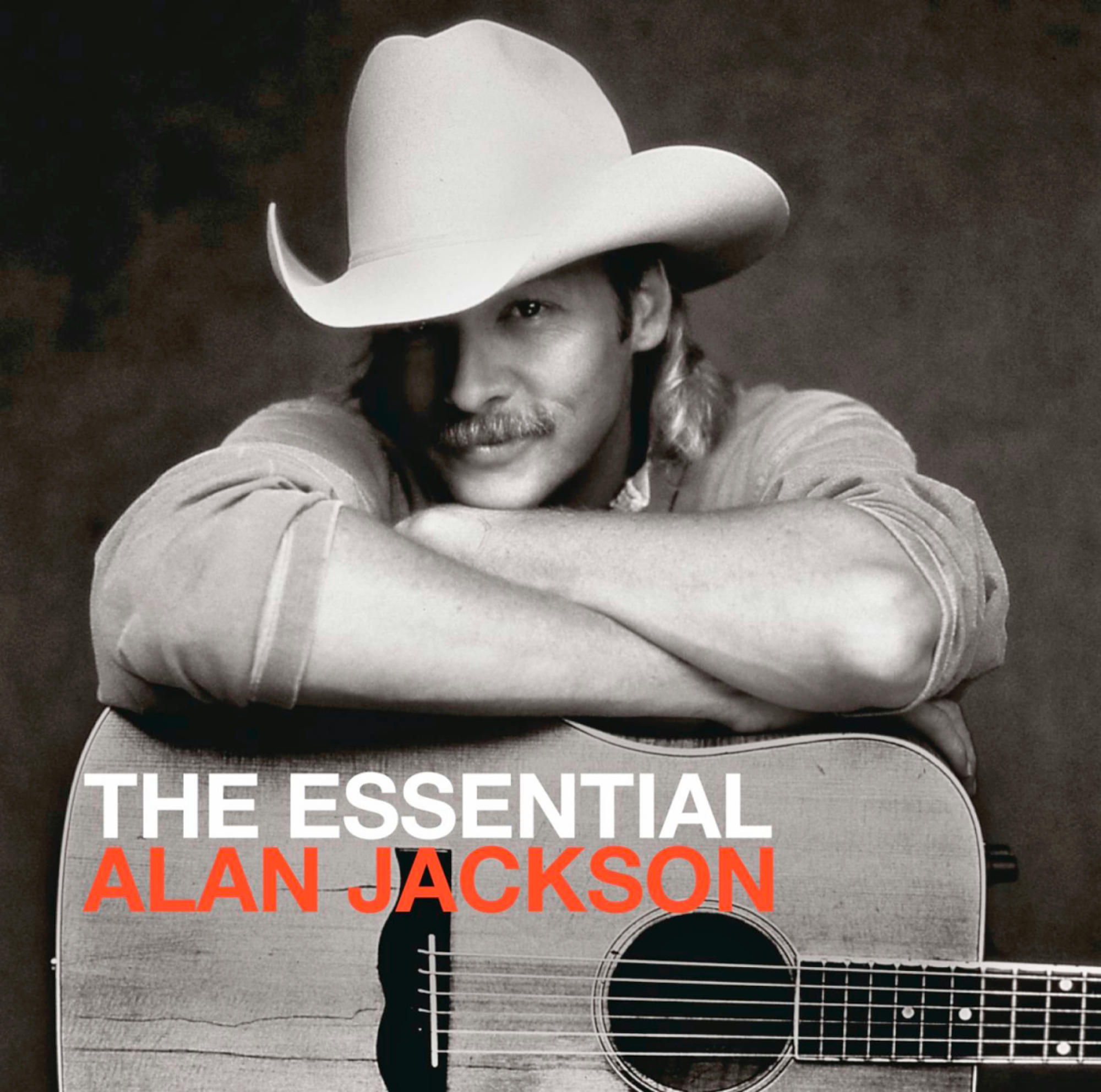 Albumcover: Alan Jackson mit Cowboyhut und Gitarre, mit Text.