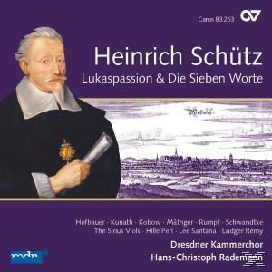 Ein lila CD-Cover mit einem Mann im Anzug und Text. Der Titel lautet 'Heinrich Schütz' und 'Lukaspassion'.